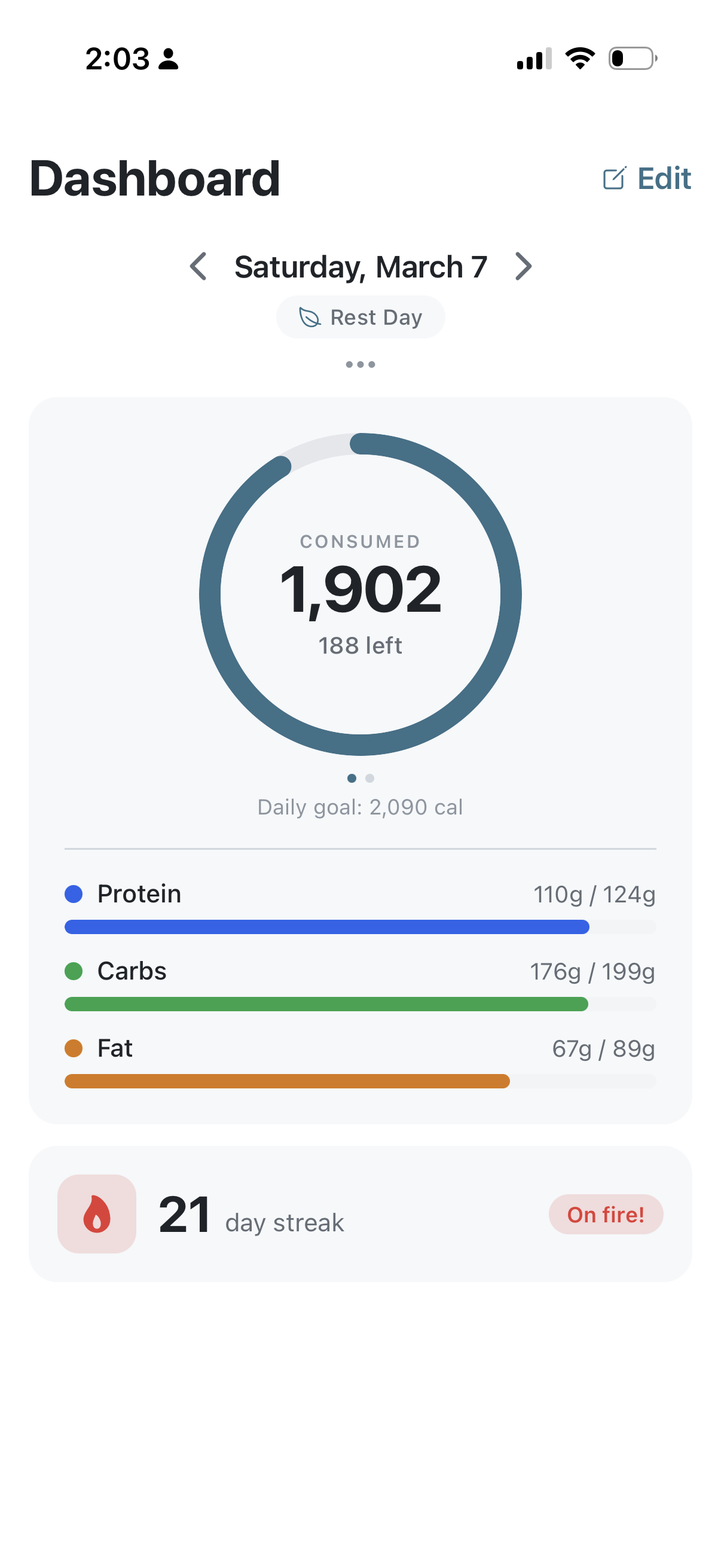 NutritionRx dashboard showing calorie ring, macro tracking, and streak